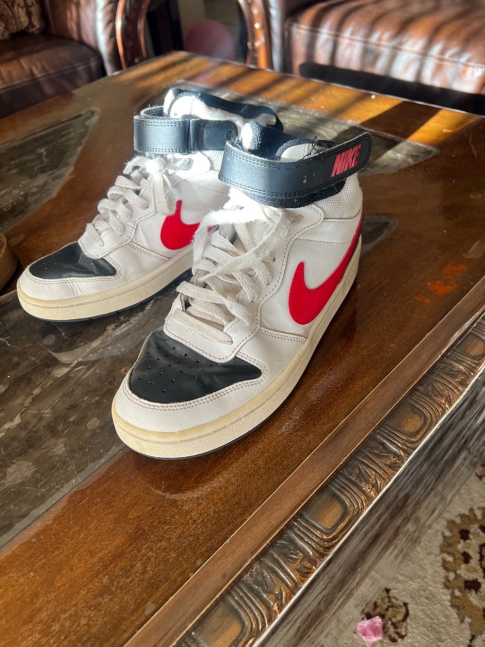 Nike White High-Top Sneakers with Red Swoosh and Black Accents